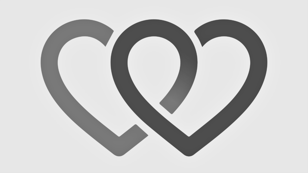 Logoen til Det gode testament. Det er to hjerter som går sammen i et evighetstegn.