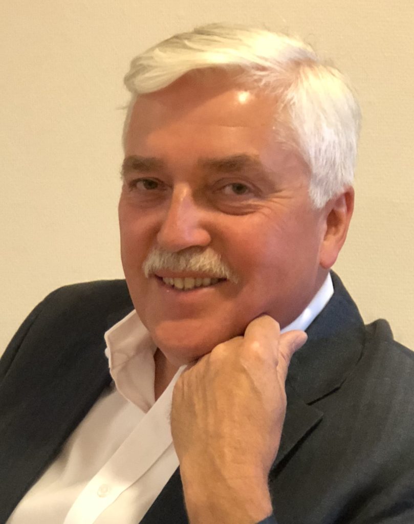 Leif Wien Jensen, innsamlingsleder i Blindeforbundet. Han har på seg hvit skjorte og svart blazer.